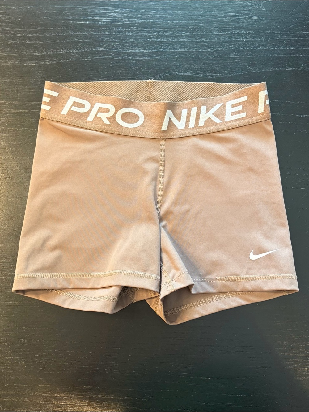 Nike Pro Women's Tan Training Shorts with White Swoosh